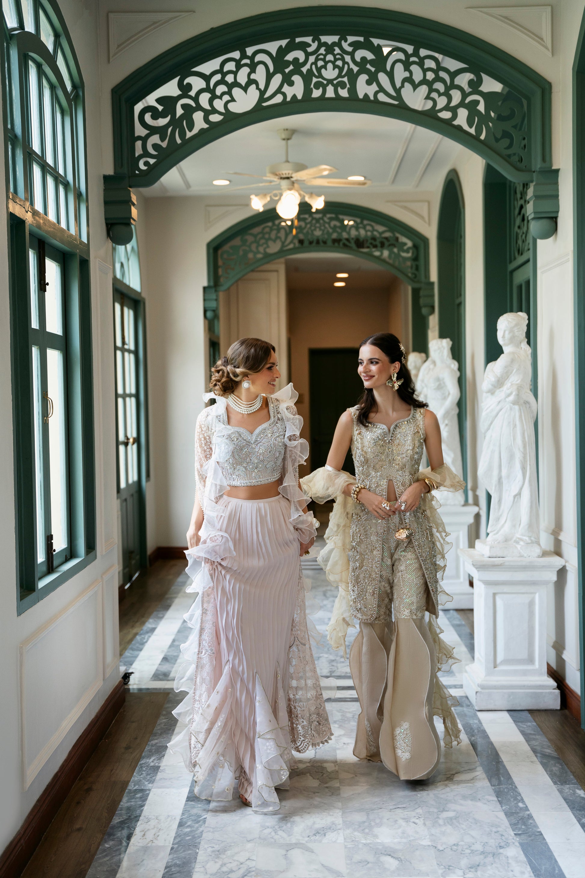 Model wearing Fifi from Mysie by Tahira, a beige embellished outfit with flared pants, perfect for Pakistani luxury pret in the UK.