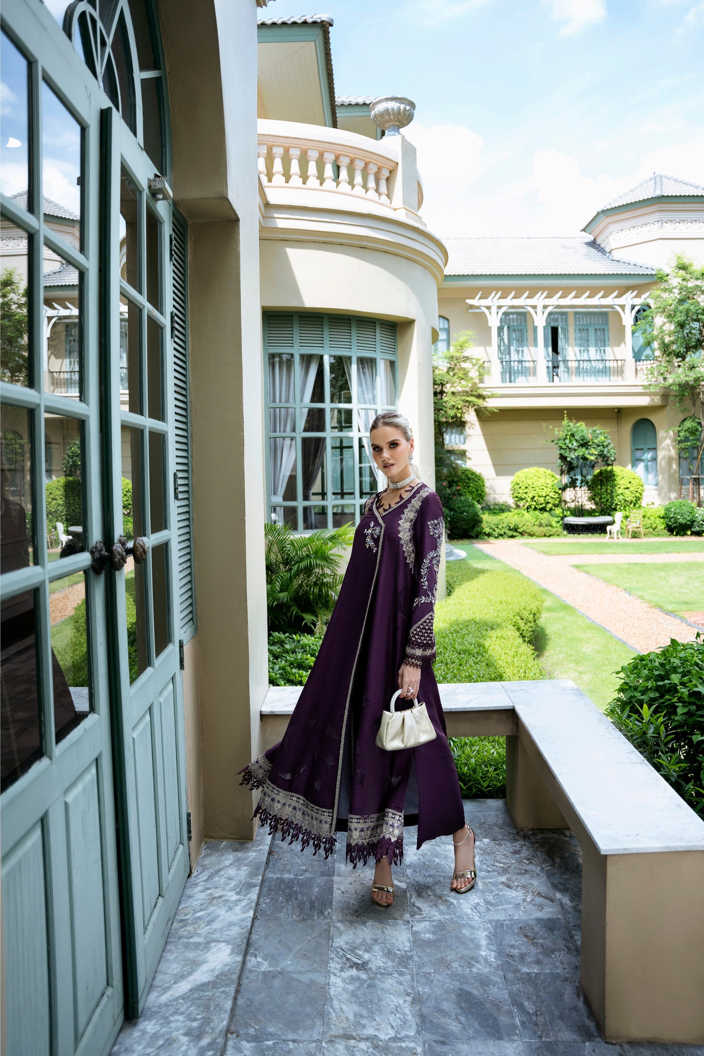 Model wearing Jamini from Mysie by Tahira, a purple embellished dress with a modern silhouette, perfect for Pakistani luxury pret in the UK.