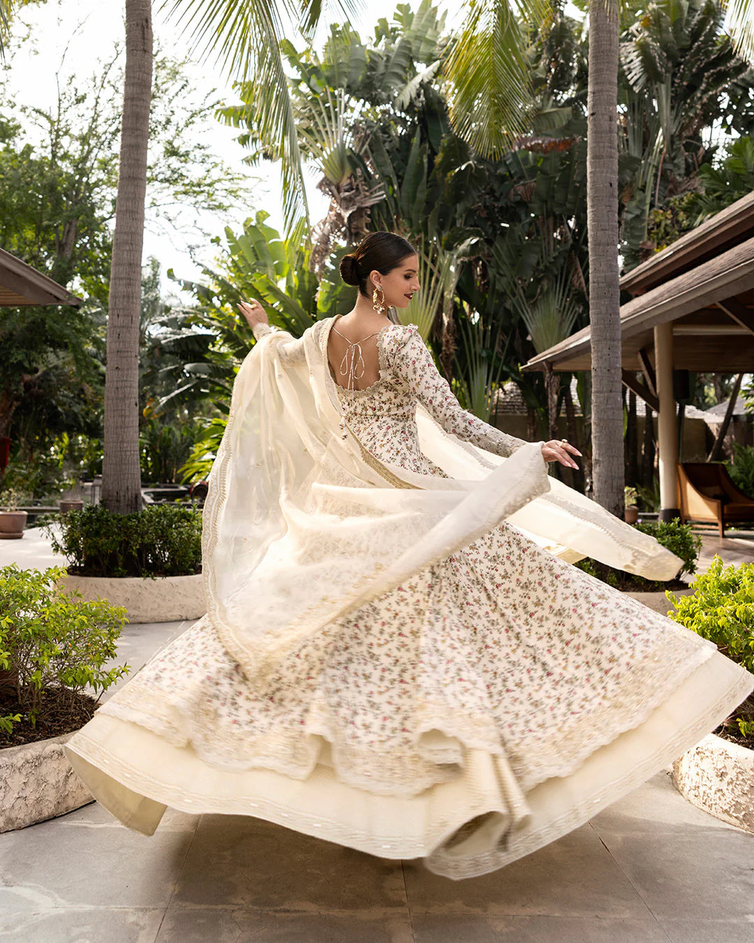 Model wearing cream floral Vinika dress from Faiza Saqlain Zinnia collection, Pakistani Luxury pret, Pakistani clothes online in UK.