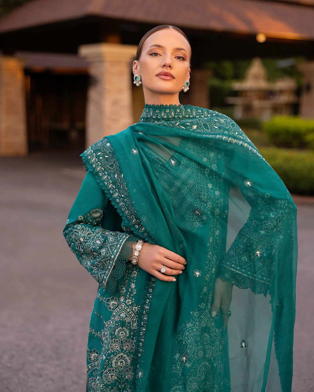 Model wearing teal Calla dress from Faiza Saqlain Zinnia collection, Pakistani Luxury pret, Faiza Saqlain Pakistani clothes online in UK.