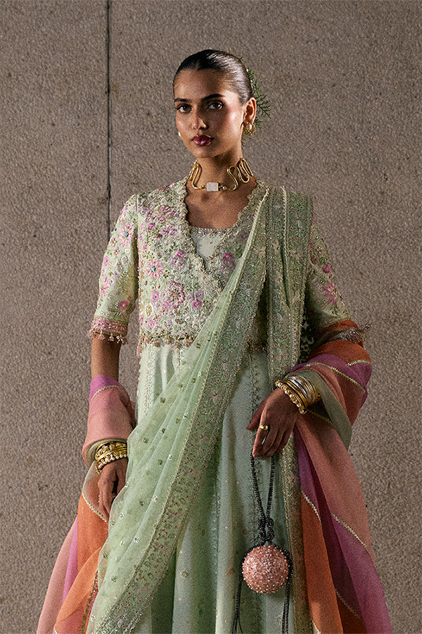 Model wearing pastel green embellished ensemble from Suffuse Aymara, Pakistani luxury pret, shop Pakistani clothes online in UK
