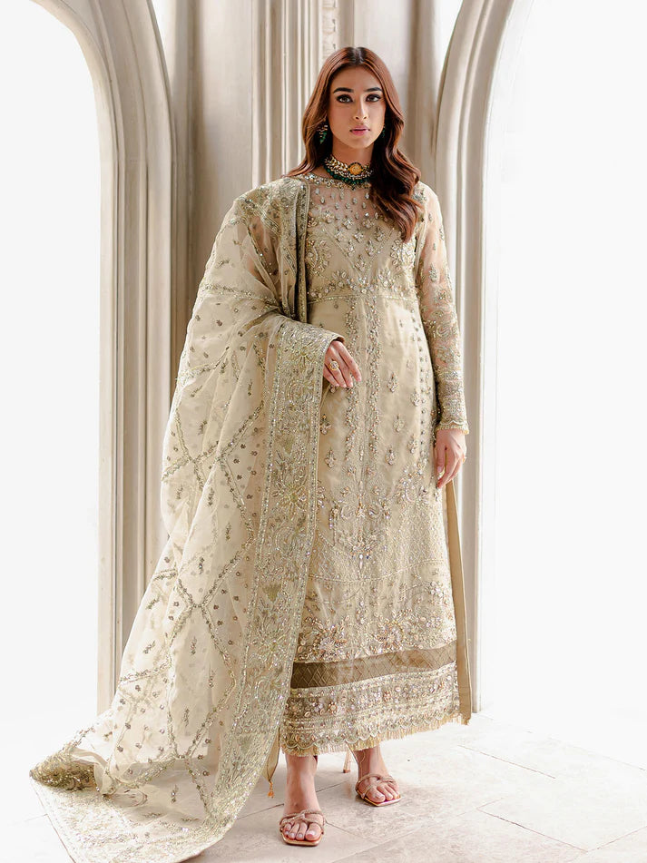 Model wearing beige Warina GL-LP-V1-05 from Gulaal, a heavily embellished Pakistani luxury pret—shop Gulaal clothes online in UK.