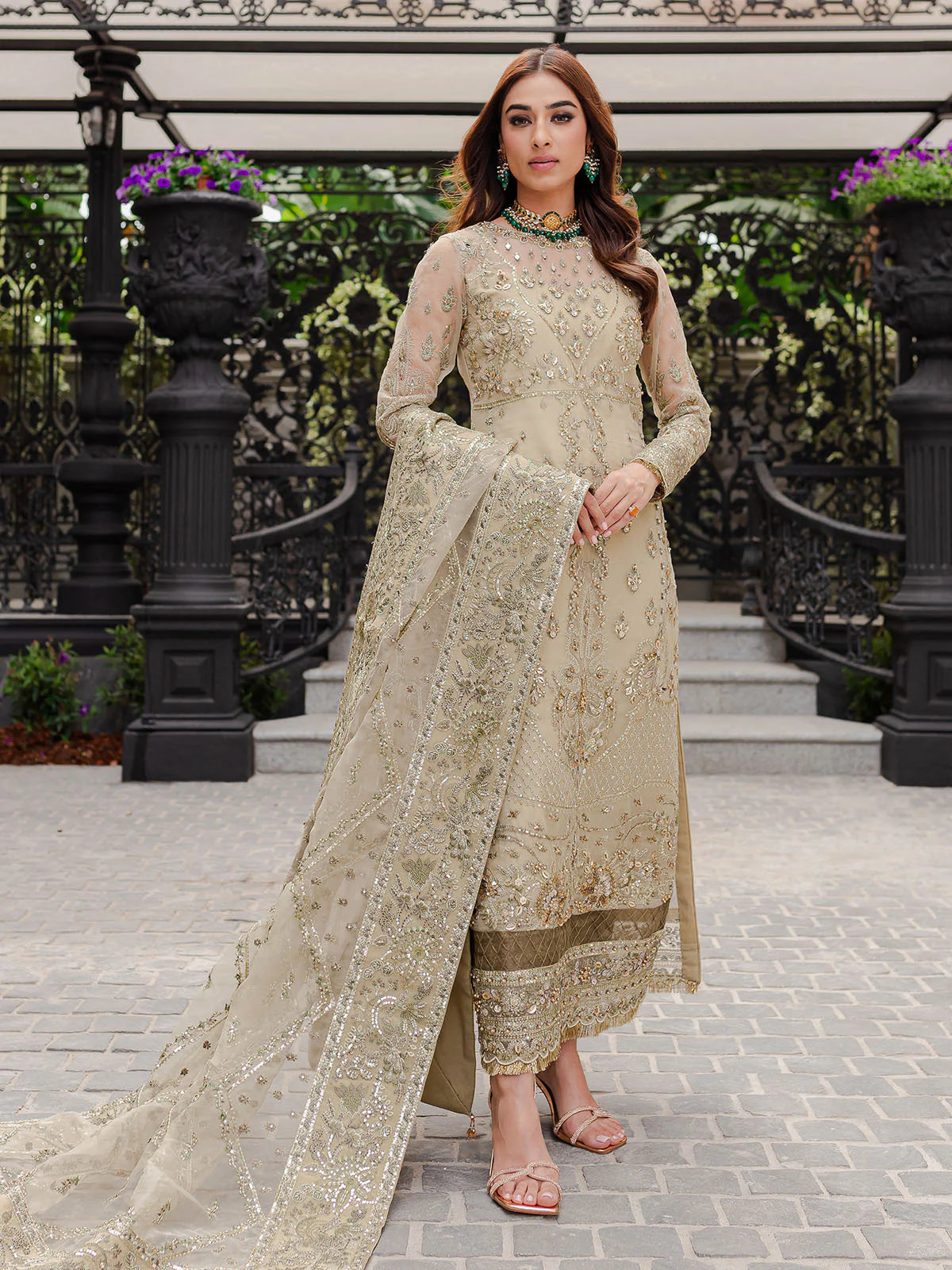 Model wearing beige Warina GL-LP-V1-05 from Gulaal, a heavily embellished Pakistani luxury pret—shop Gulaal clothes online in UK.