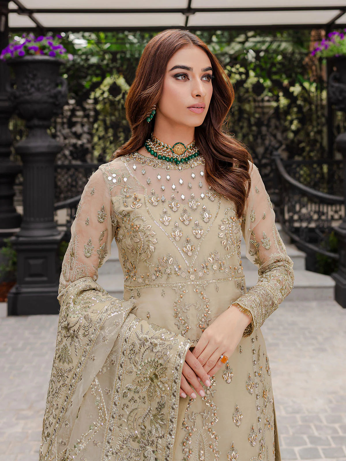 Model wearing beige Warina GL-LP-V1-05 from Gulaal, a heavily embellished Pakistani luxury pret—shop Gulaal clothes online in UK.