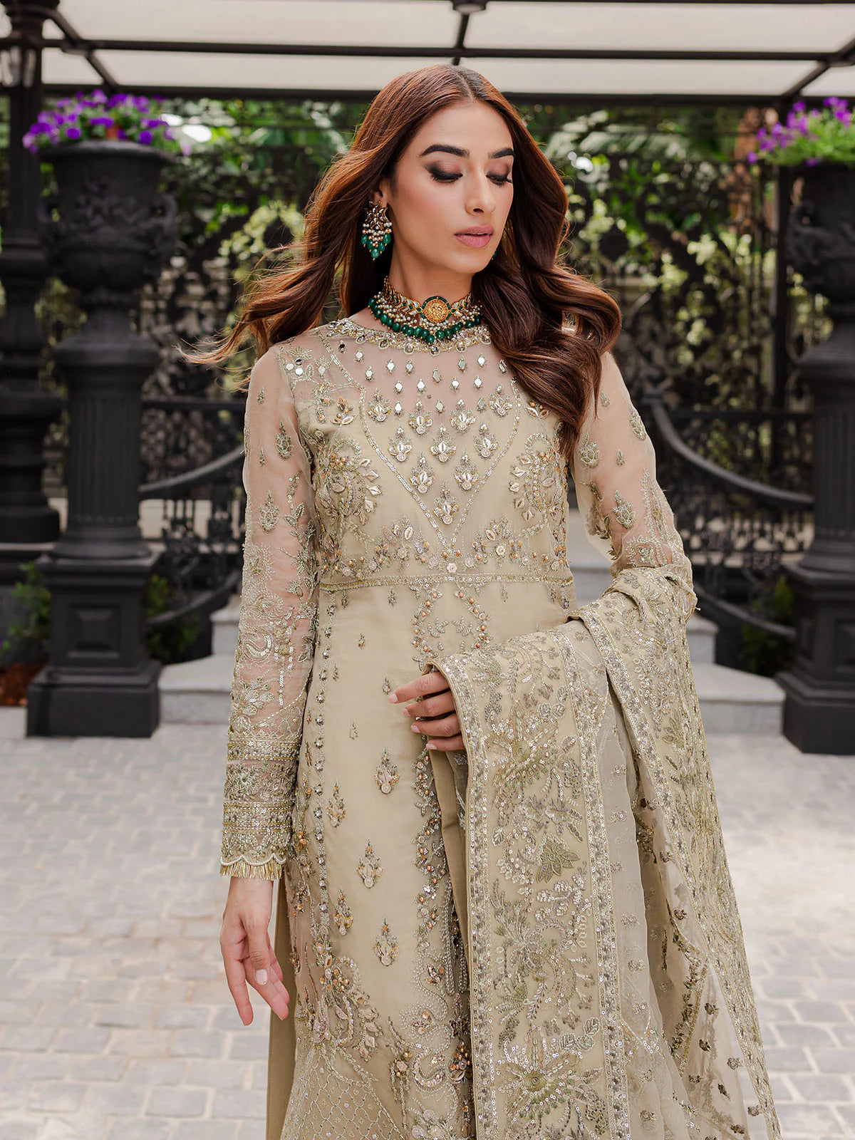 Model wearing beige Warina GL-LP-V1-05 from Gulaal, a heavily embellished Pakistani luxury pret—shop Gulaal clothes online in UK.