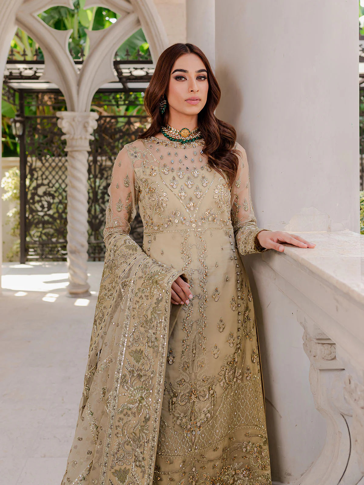 Model wearing beige Warina GL-LP-V1-05 from Gulaal, a heavily embellished Pakistani luxury pret—shop Gulaal clothes online in UK.