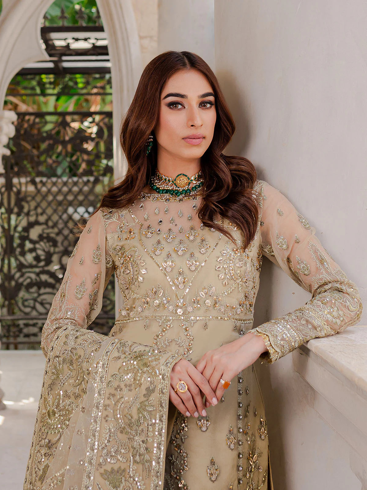 Model wearing beige Warina GL-LP-V1-05 from Gulaal, a heavily embellished Pakistani luxury pret—shop Gulaal clothes online in UK.
