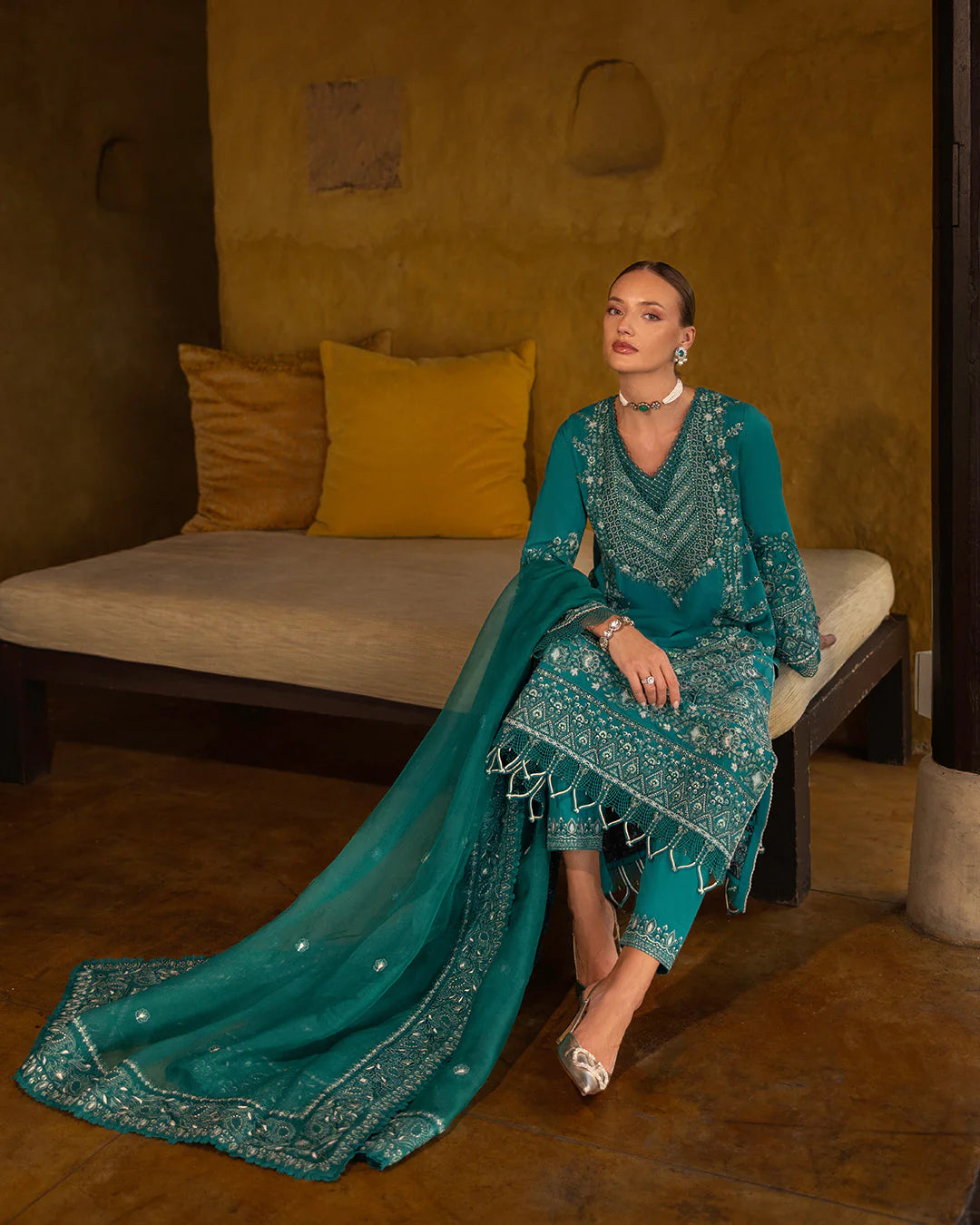Model wearing teal Calla dress from Faiza Saqlain Zinnia collection, Pakistani Luxury pret, Faiza Saqlain Pakistani clothes online in UK.