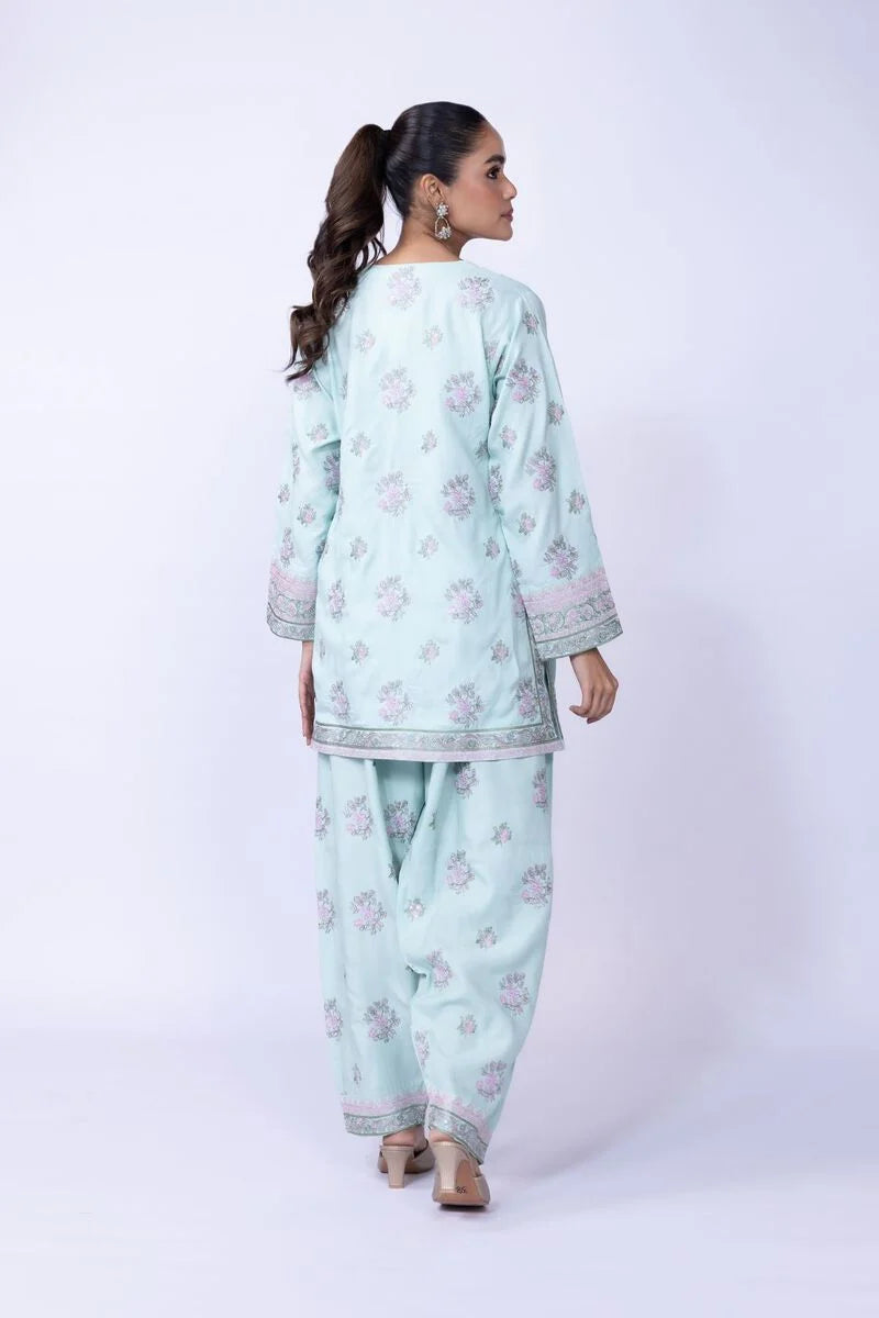 Model wearing Khaadi EST24602B pastel blue dress with delicate floral prints and embroidered details. Shop Pakistani clothes online in the UK now.







