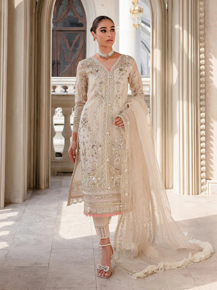 Model wearing ivory Yaram outfit from Gulaal—elegant Pakistani luxury pret, perfect for festive wear, shop Pakistani clothes online in UK.