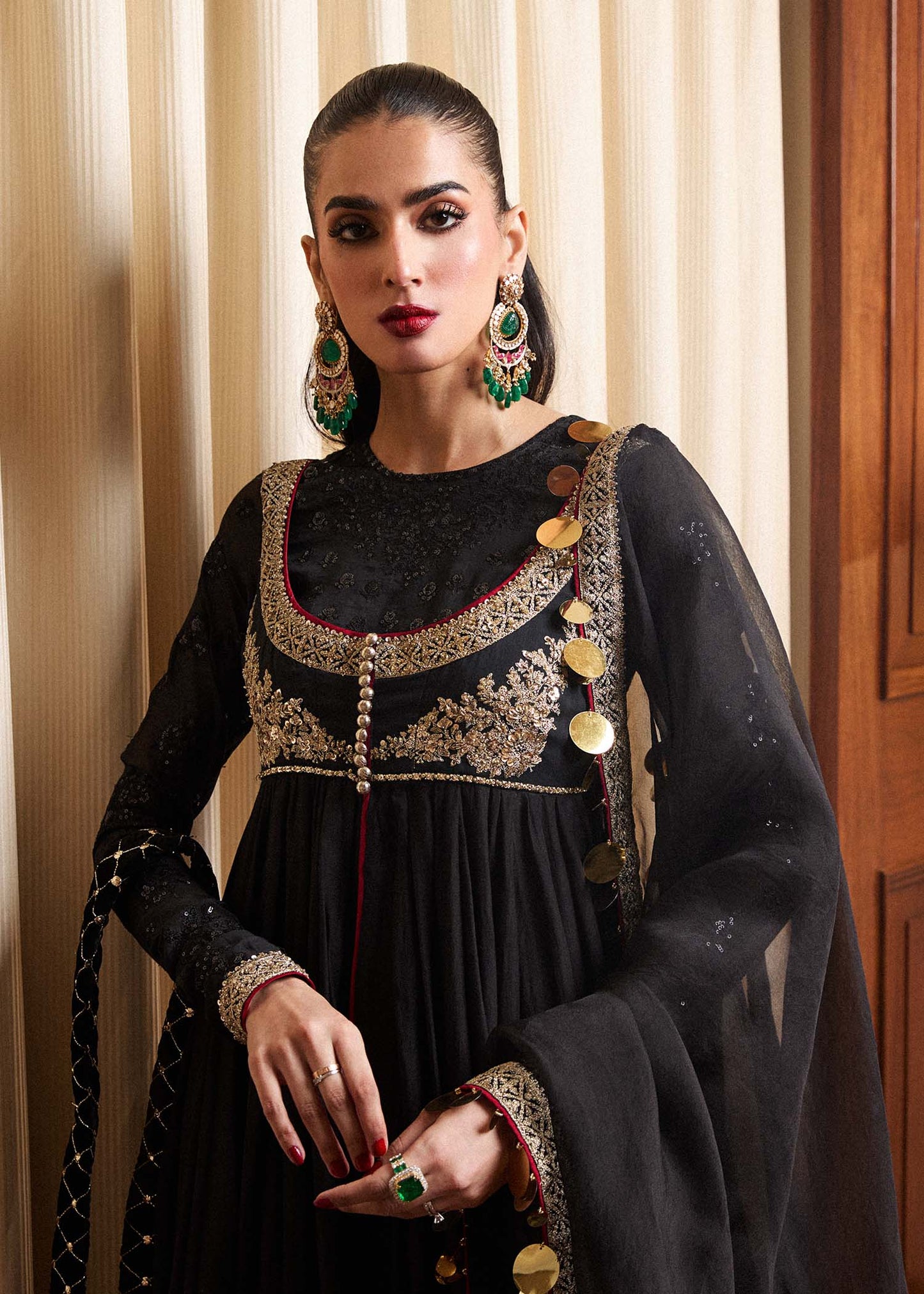 Model wearing a black Rubai dress from Hussain Rehar's Luxury Pret collection. Pakistani clothes online in UK.