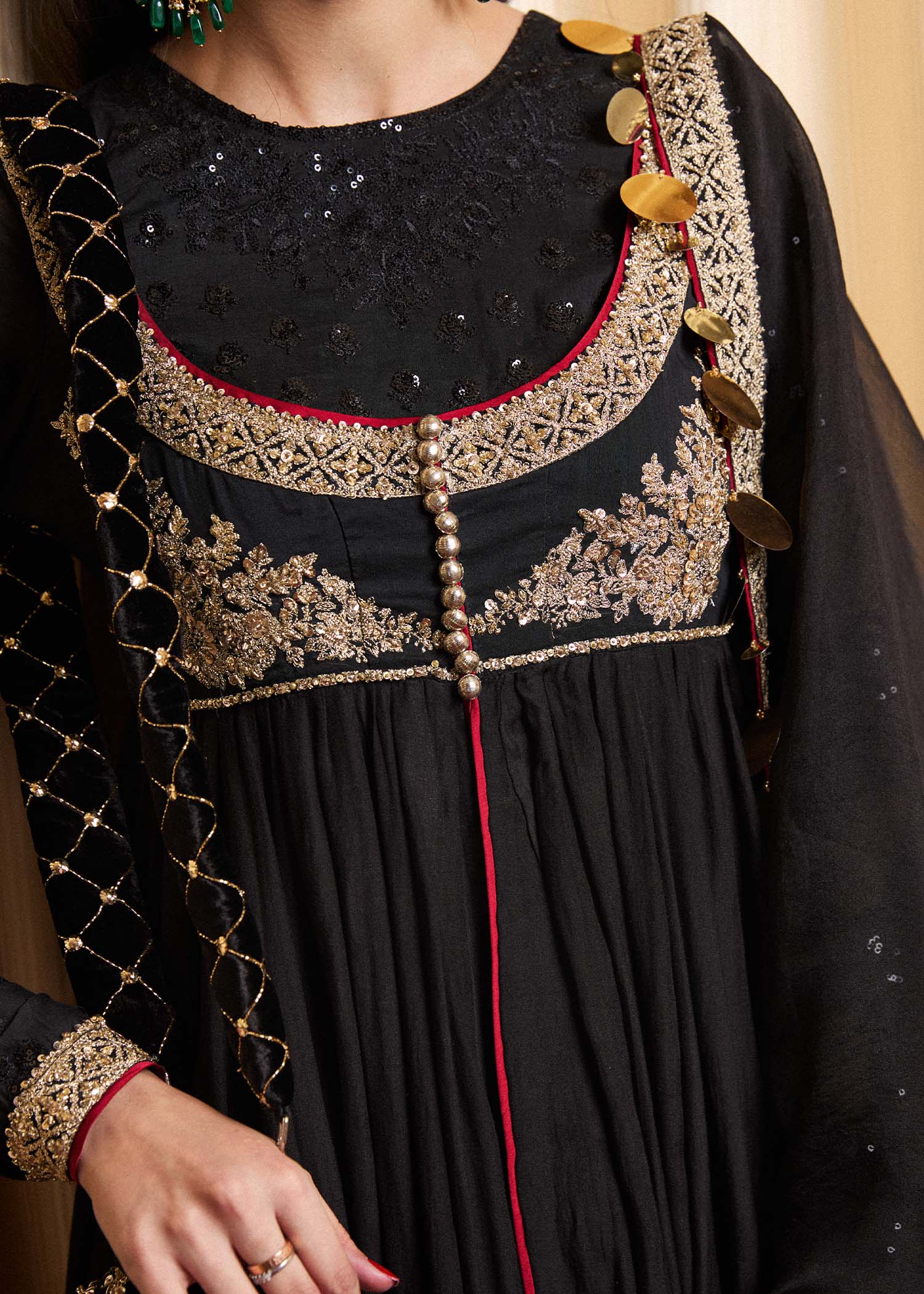 Model wearing a black Rubai dress from Hussain Rehar's Luxury Pret collection. Pakistani clothes online in UK.