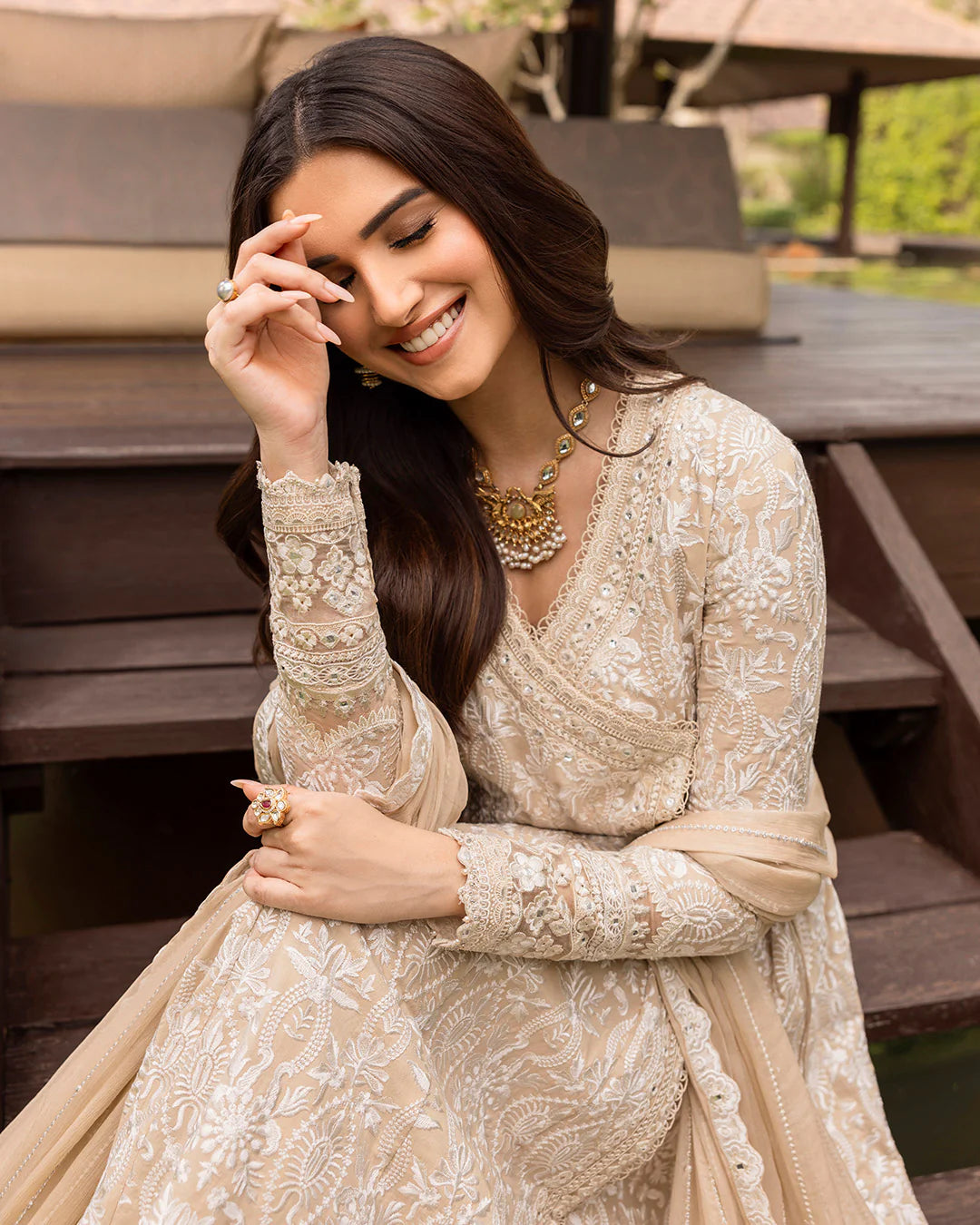 Model wearing ivory Ilima dress from Faiza Saqlain Zinnia collection, Pakistani Luxury pret, Pakistani clothes online in UK.