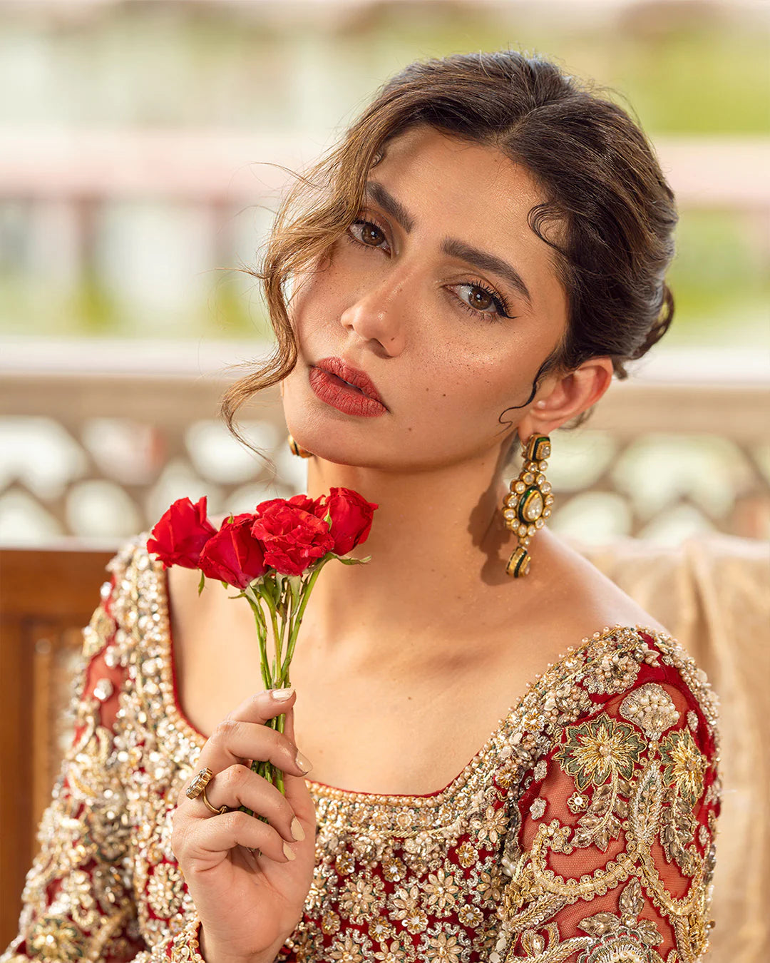 Model wearing deep red and gold bridal dress Juri by Faiza Saqlain, Pakistani luxury pret online in UK for weddings.