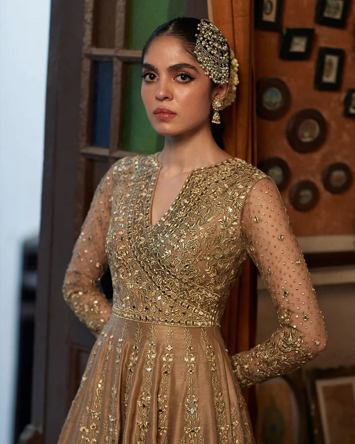 Model wearing beige and multicolor dress Sulata by Faiza Saqlain, Pakistani luxury pret, available online in UK