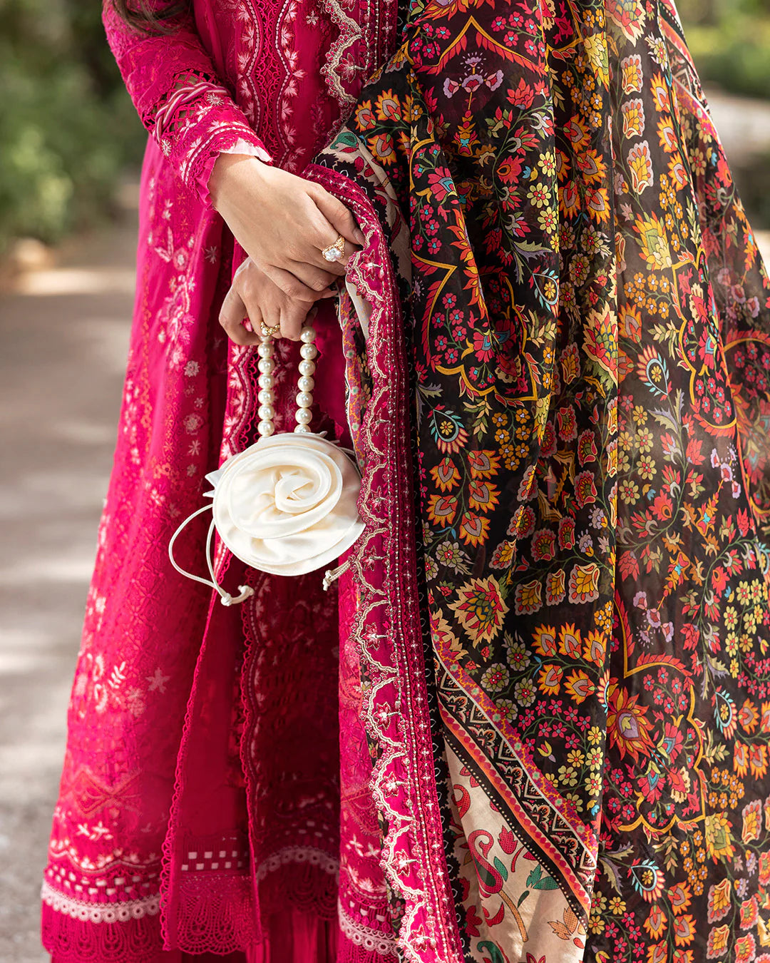 Model wearing vibrant pink Varda dress from Faiza Saqlain Zinnia, Pakistani Luxury pret, Pakistani clothes online in UK.