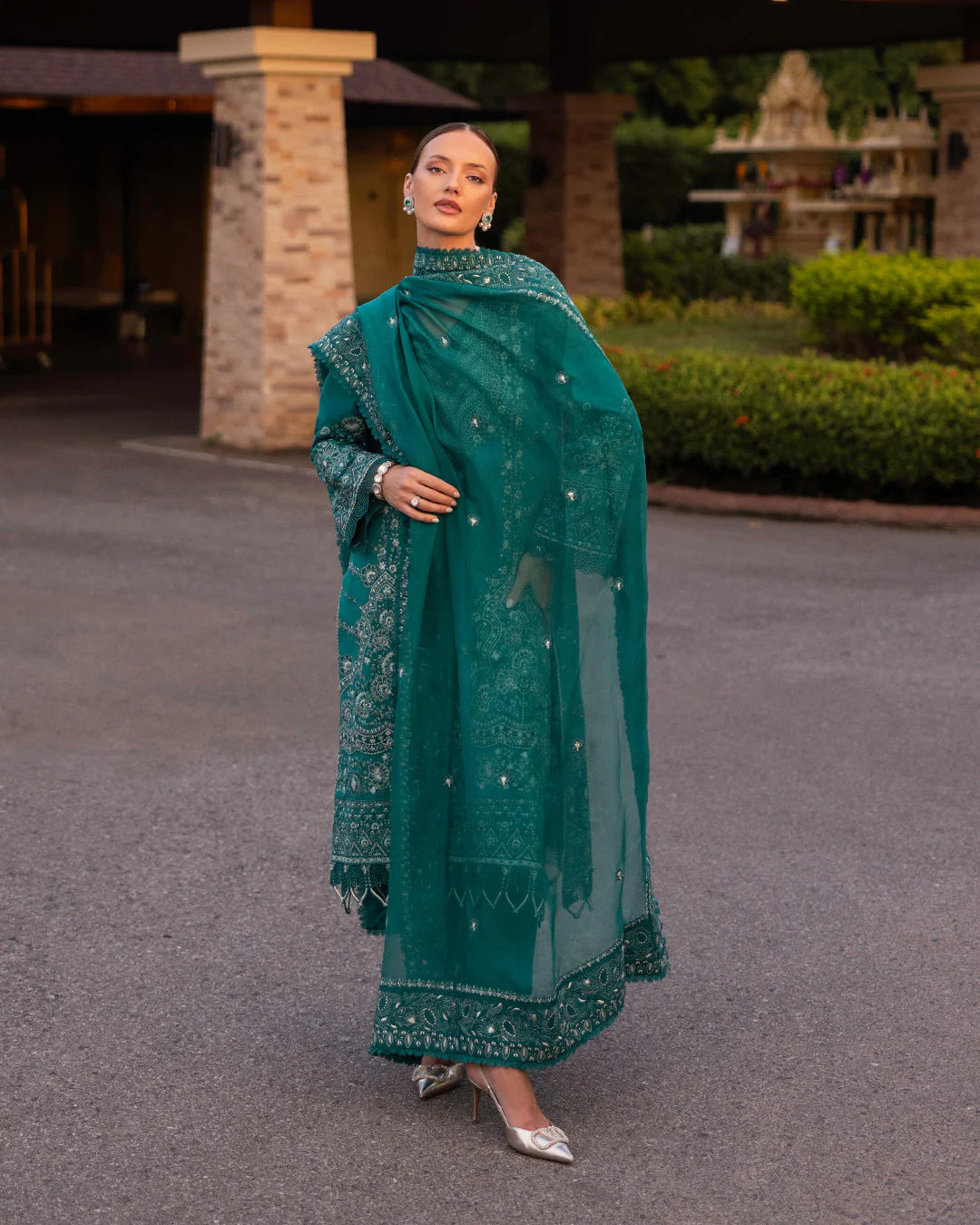 Model wearing teal Calla dress from Faiza Saqlain Zinnia collection, Pakistani Luxury pret, Faiza Saqlain Pakistani clothes online in UK.