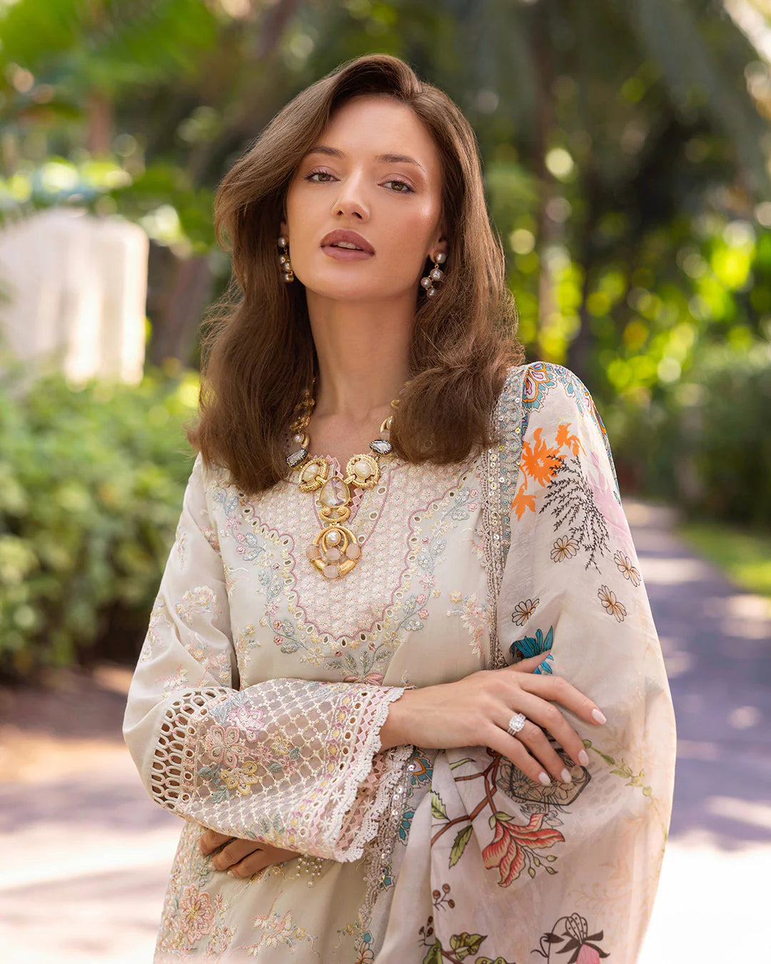 Model wearing cream Delilah dress from Faiza Saqlain Zinnia, Pakistani Luxury pret, Pakistani clothes online in UK.