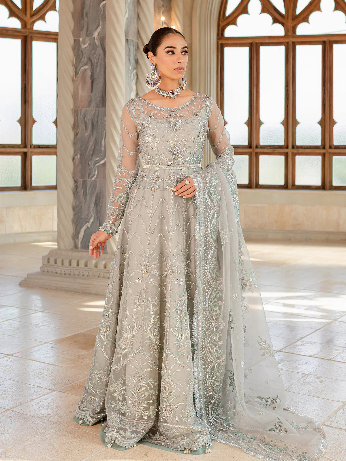 Model wearing silver-grey Naimaah GL-LP-V1-07 from Gulaal, featuring intricate embroidery—Pakistani luxury pret clothes online in UK.