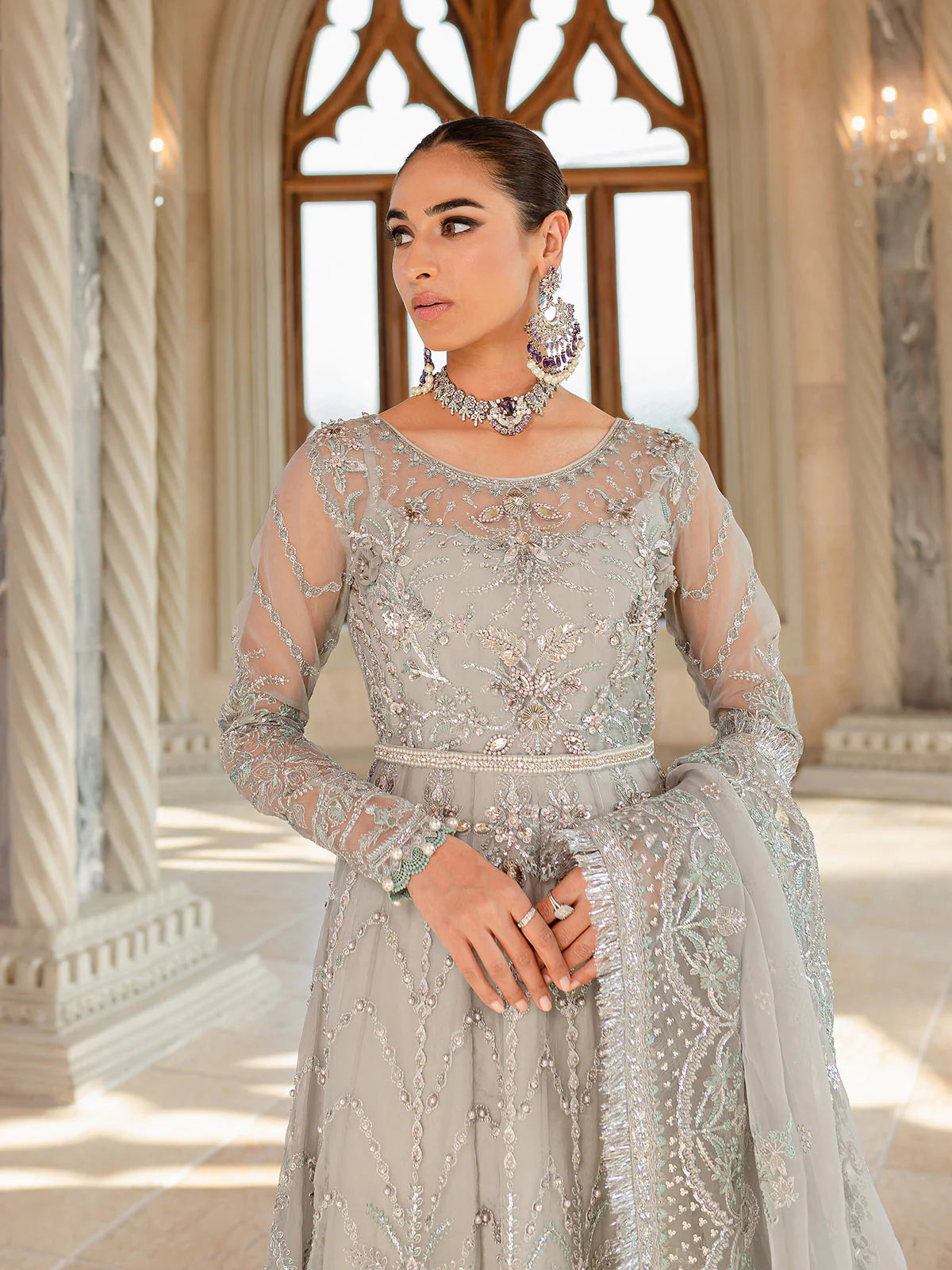 Model wearing silver-grey Naimaah GL-LP-V1-07 from Gulaal, featuring intricate embroidery—Pakistani luxury pret clothes online in UK.