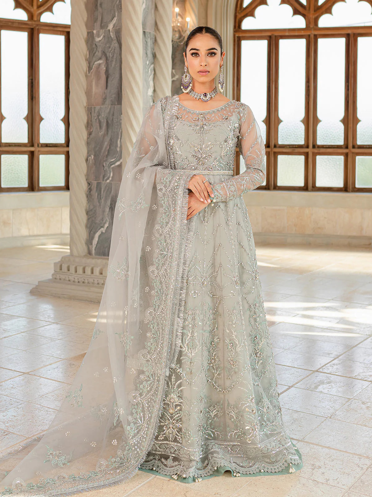Model wearing silver-grey Naimaah GL-LP-V1-07 from Gulaal, featuring intricate embroidery—Pakistani luxury pret clothes online in UK.