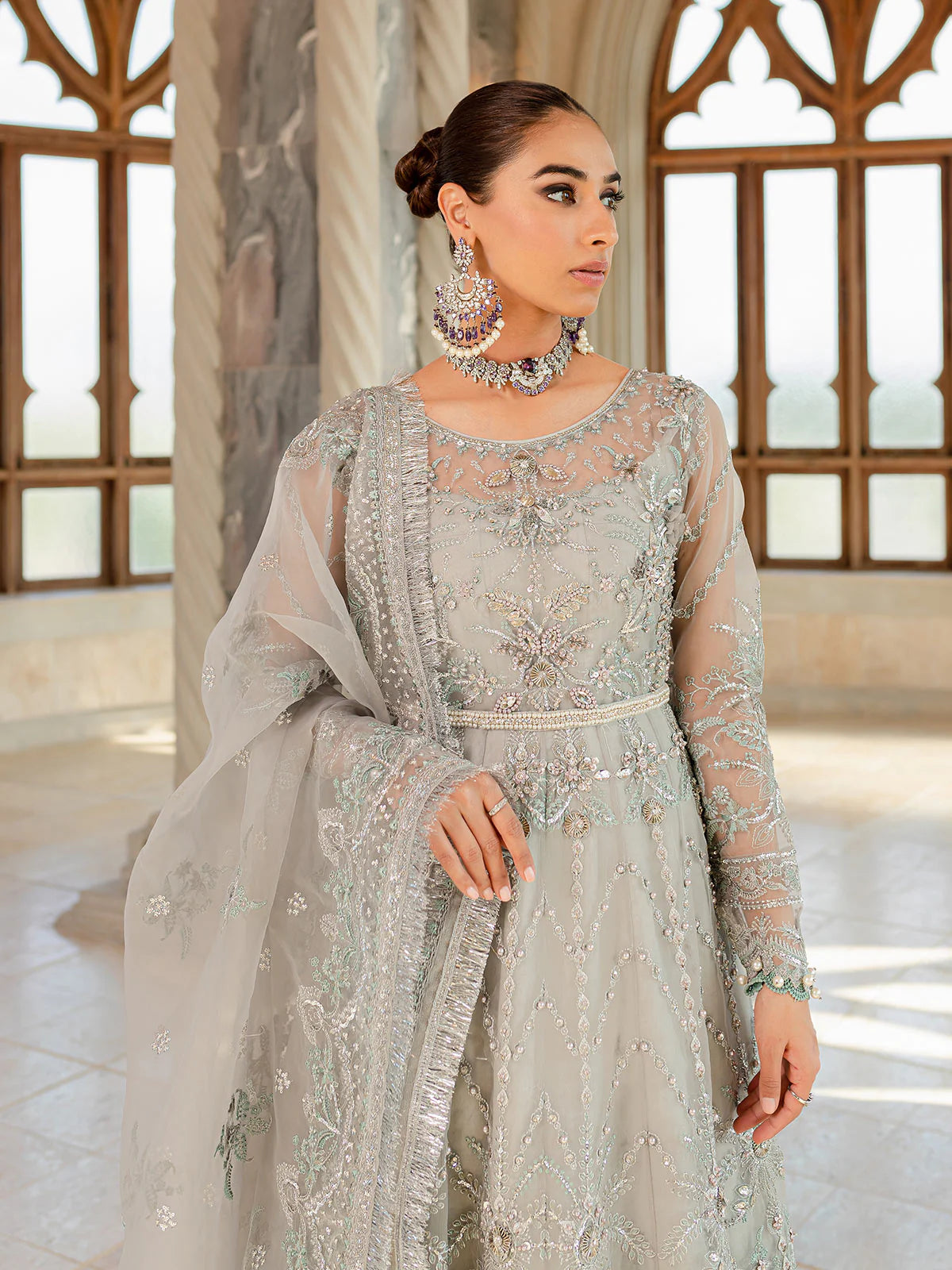 Model wearing silver-grey Naimaah GL-LP-V1-07 from Gulaal, featuring intricate embroidery—Pakistani luxury pret clothes online in UK.