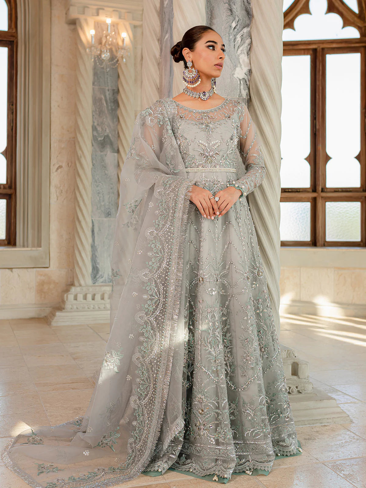Model wearing silver-grey Naimaah GL-LP-V1-07 from Gulaal, featuring intricate embroidery—Pakistani luxury pret clothes online in UK.