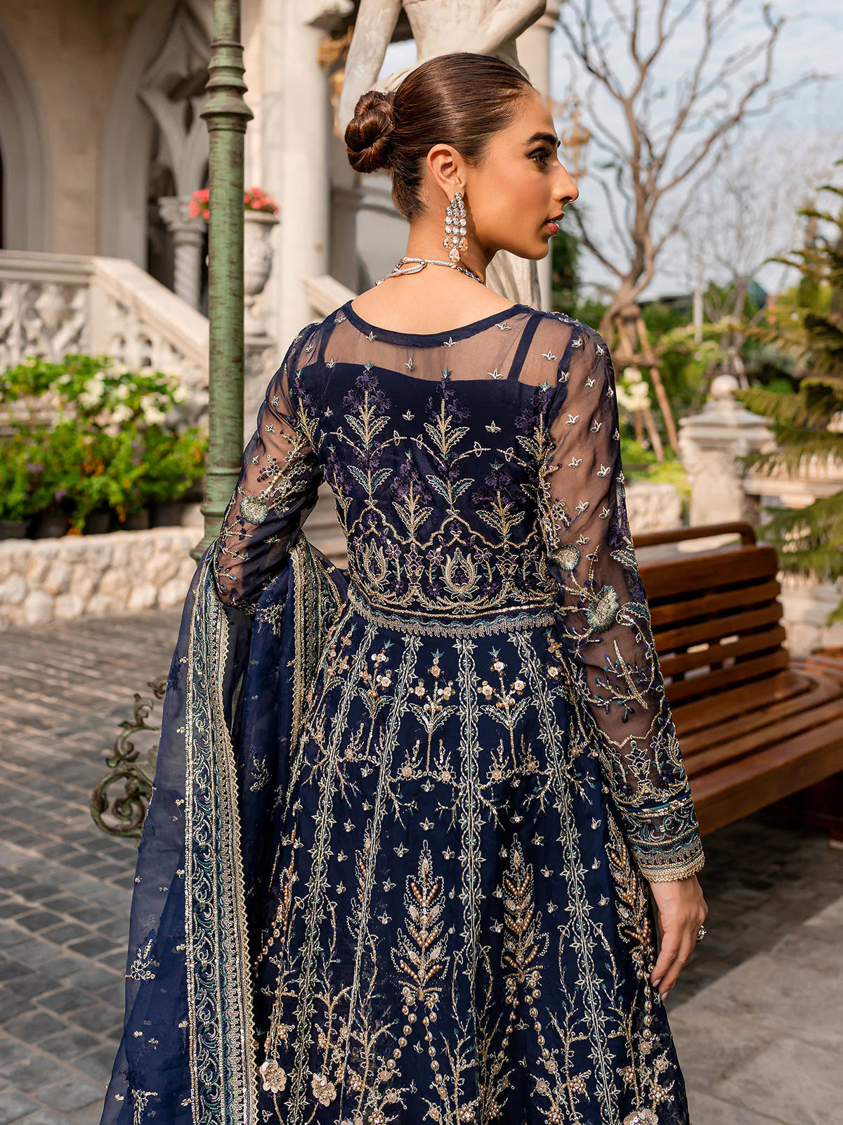Model wearing navy blue Miray GL-LP-V1-08 from Gulaal, a heavily embroidered Pakistani luxury pret—shop Gulaal clothes online in UK.