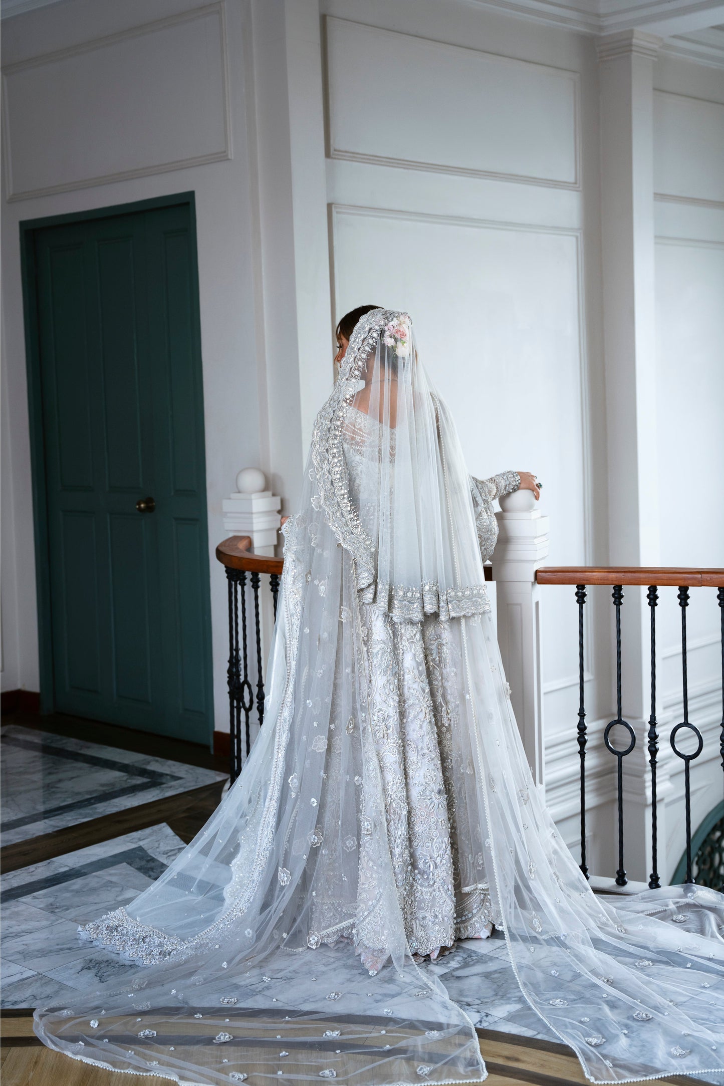 Model wearing silver embellished gown DAHLIA from Mysie by Tahira, Pakistani luxury pret perfect for weddings, now online in UK.