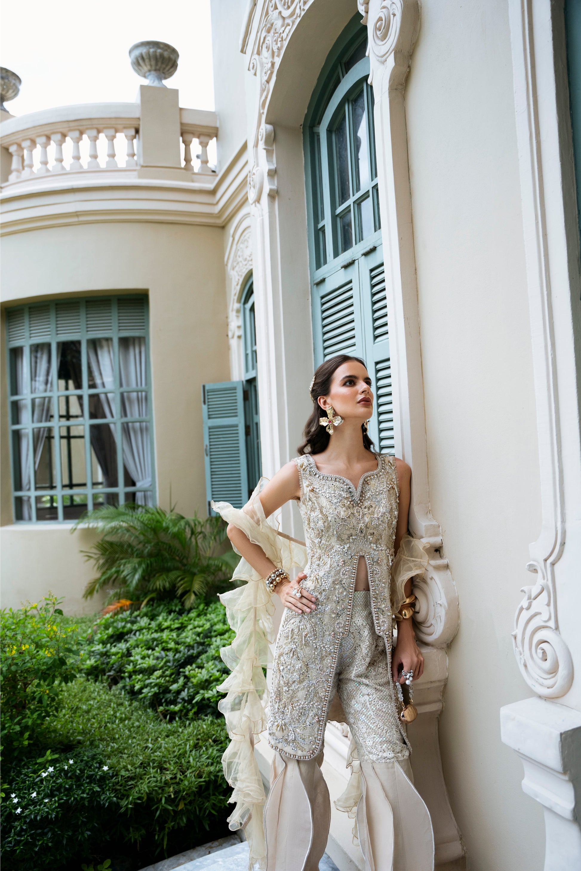 Model wearing Fifi from Mysie by Tahira, a beige embellished outfit with flared pants, perfect for Pakistani luxury pret in the UK.