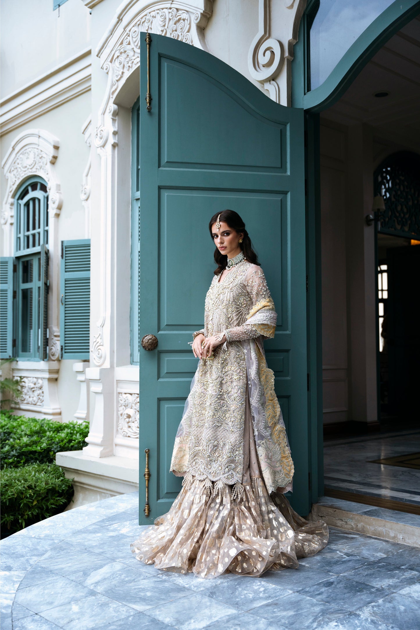 Model wearing PEONY from Mysie by Tahira, a soft beige and gold embellished ensemble, perfect for Pakistani luxury pret in the UK.