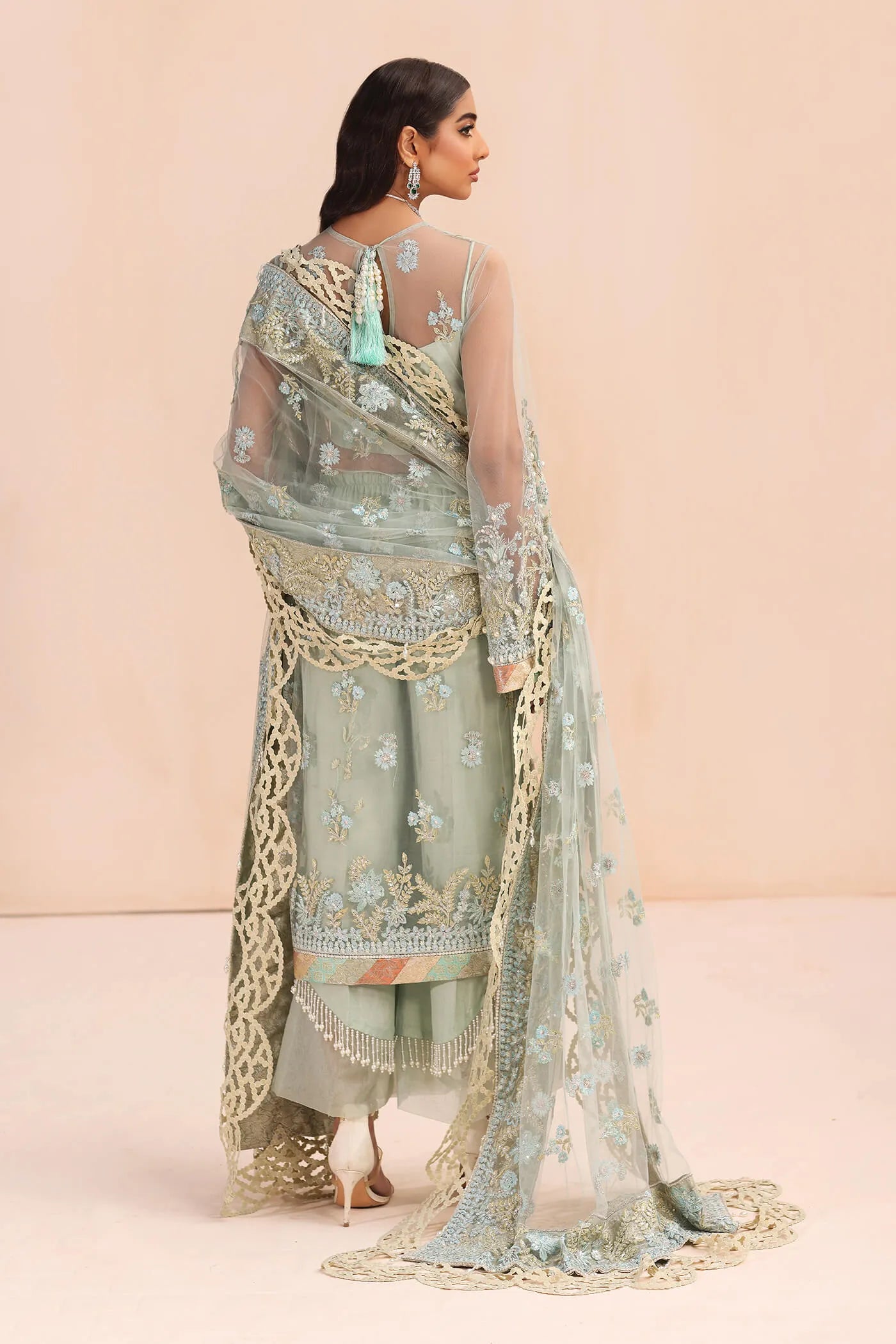 Model in Musferah Saad Aqua Treasure ice blue Pakistani wedding dress, UK.