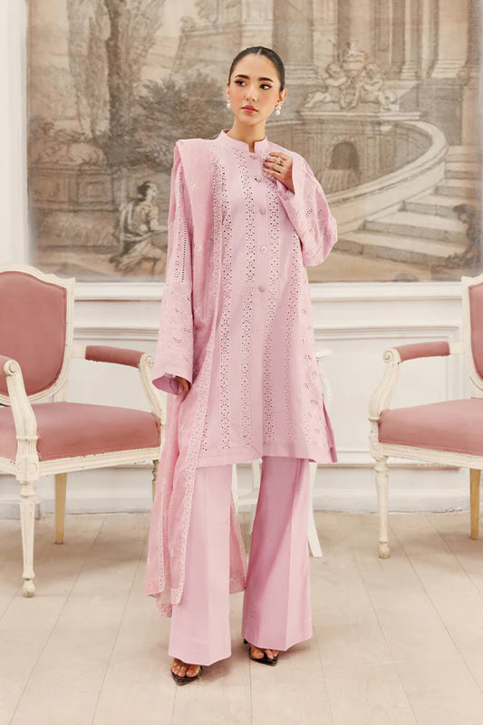 Model wearing Soft Petals by Saffron in pastel pink with delicate cutwork – chic Pakistani luxury pret outfit available online in UK.