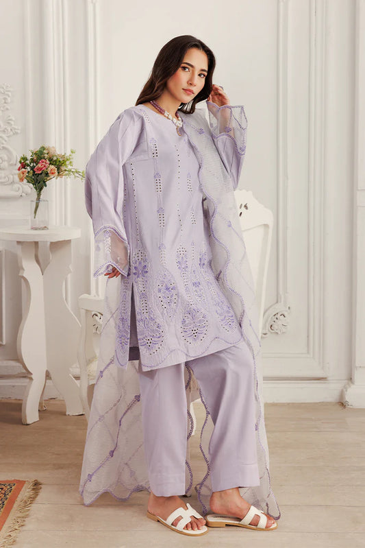 Model wearing Lilac Dust by Saffron in soft lavender with intricate detailing – Pakistani luxury pret outfit online in UK.