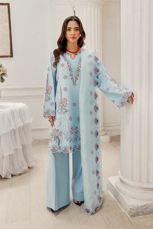 Model wearing Blush Skies by Saffron in pastel blue with delicate embroidery – premium Pakistani luxury pret outfit online in UK.