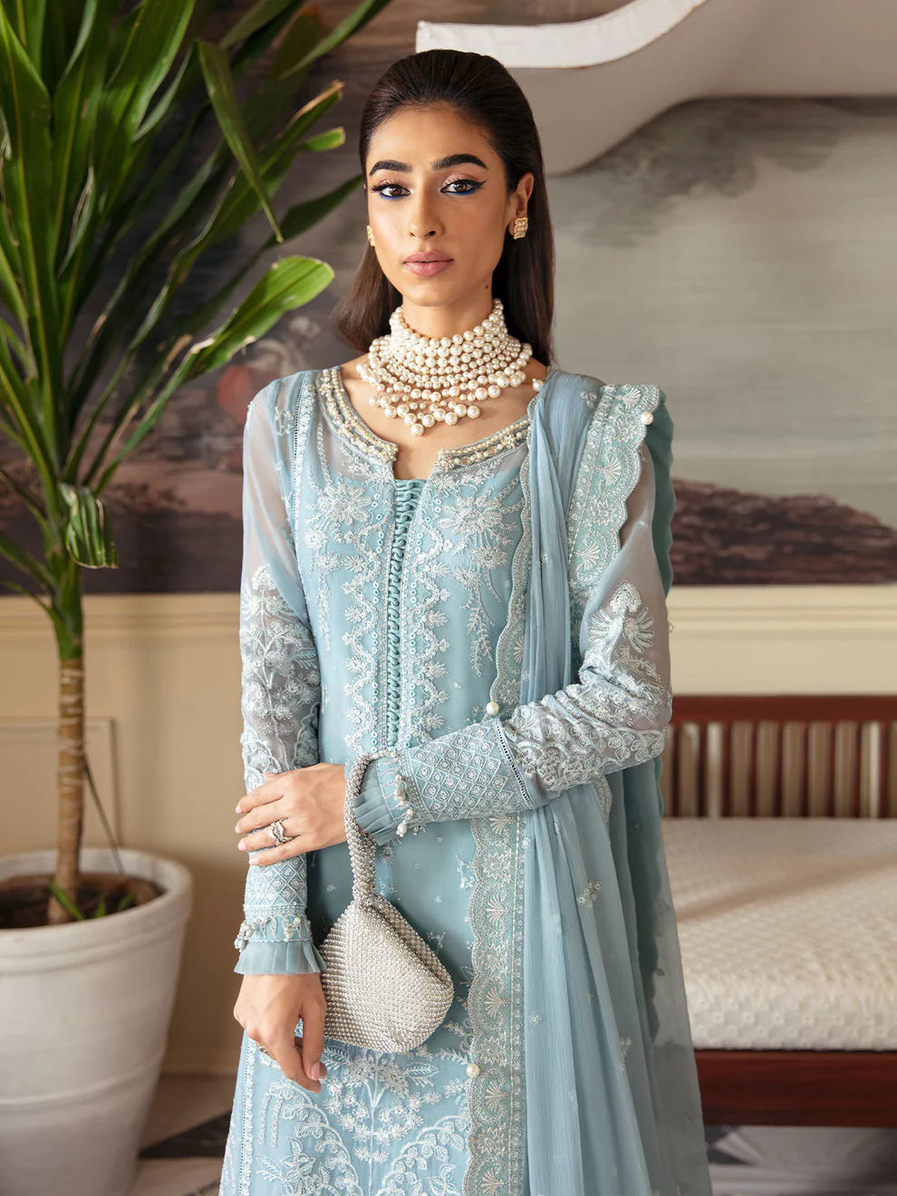 Model in Gulaal UK CALYPSO, light blue embroidered chiffon, part of the '23 V1 Pakistani collection.