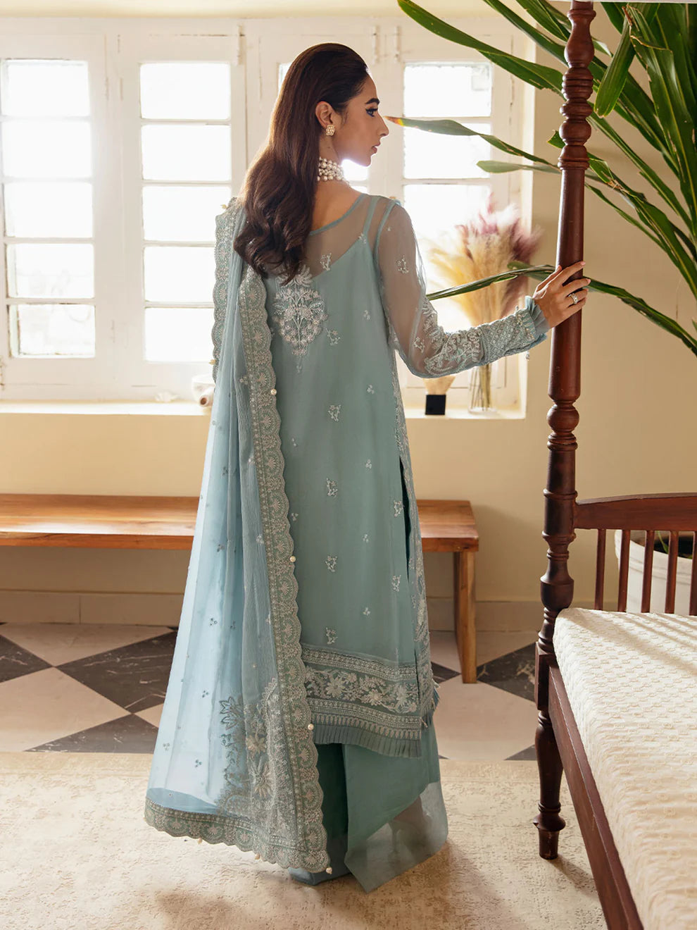 Model in Gulaal UK CALYPSO, light blue embroidered chiffon, part of the '23 V1 Pakistani collection.