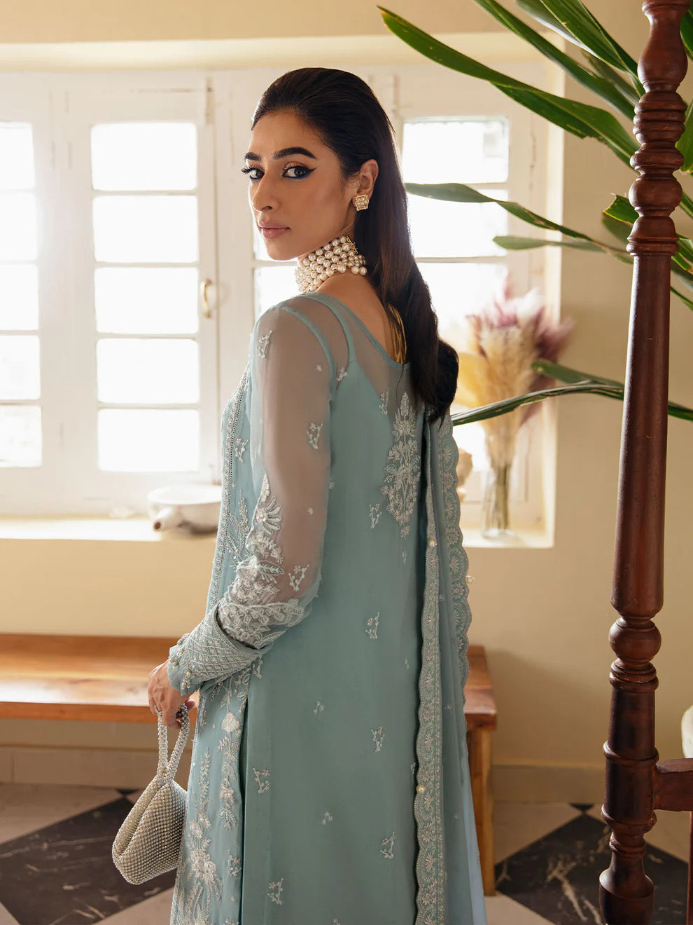 Model in Gulaal UK CALYPSO, light blue embroidered chiffon, part of the '23 V1 Pakistani collection.