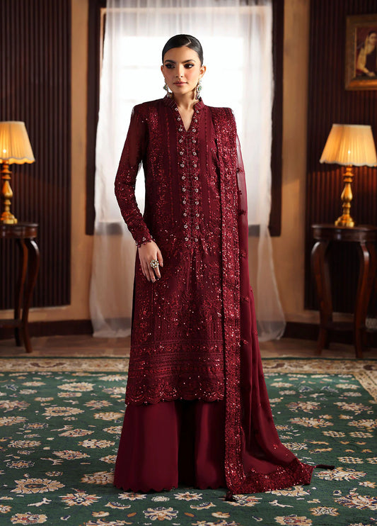 Model wearing Vezeen by Gulaal in deep maroon embellished chiffon – Pakistani luxury pret outfit available online in UK.