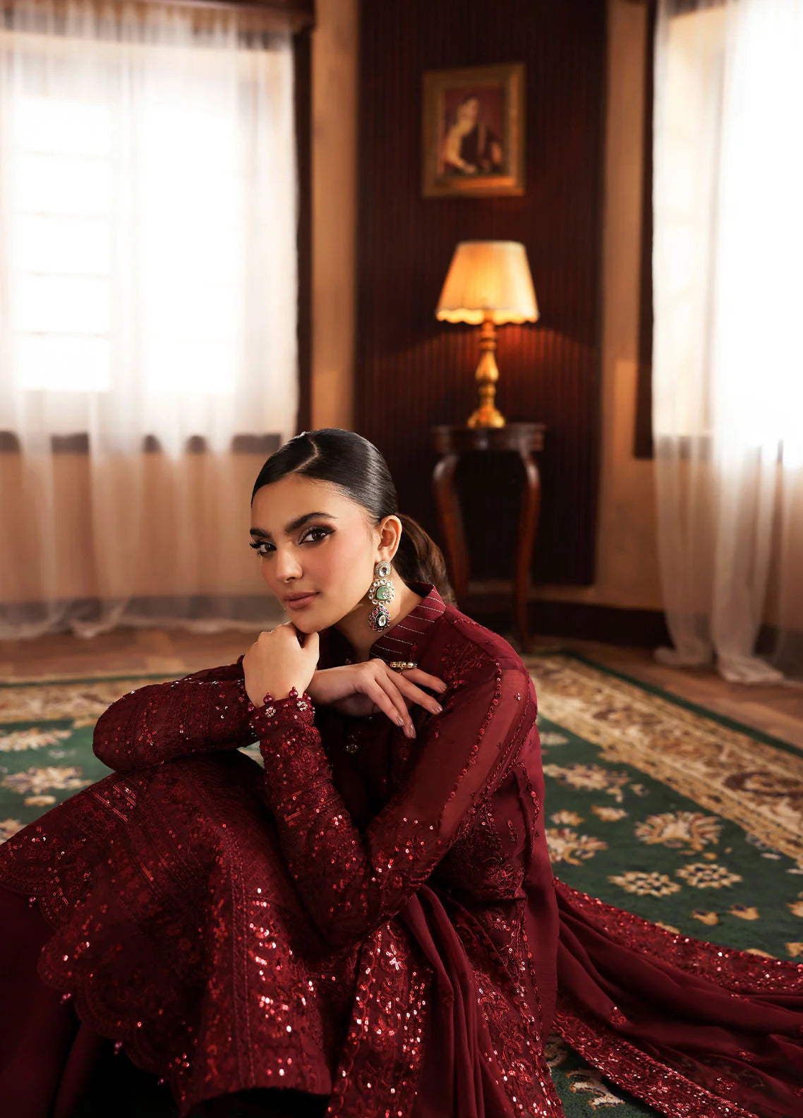 Model wearing Vezeen by Gulaal in deep maroon embellished chiffon – Pakistani luxury pret outfit available online in UK.