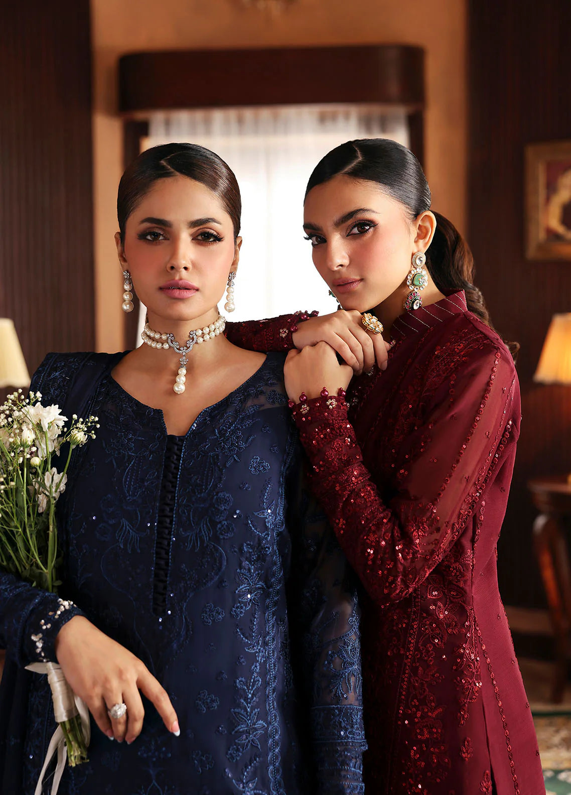 Model wearing Vezeen by Gulaal in deep maroon embellished chiffon – Pakistani luxury pret outfit available online in UK.