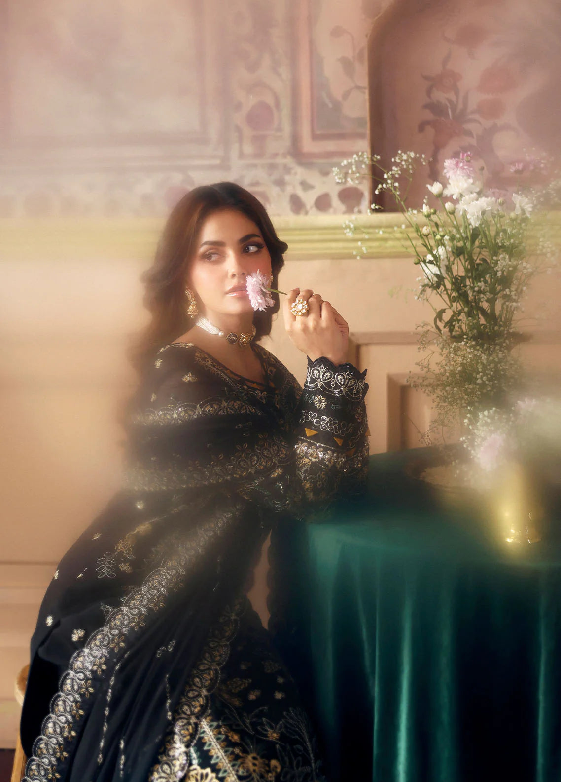 Model wearing Deenah by Gulaal in black with intricate gold chiffon embroidery – Pakistani luxury pret outfit online in UK.