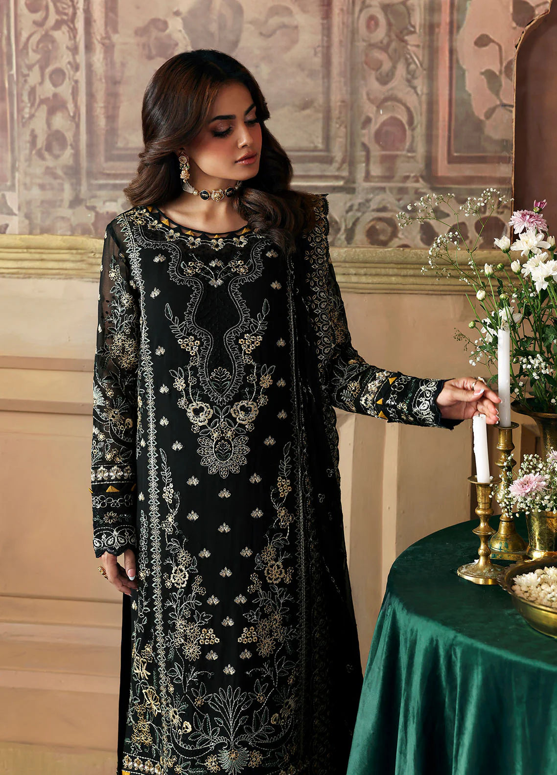 Model wearing Deenah by Gulaal in black with intricate gold chiffon embroidery – Pakistani luxury pret outfit online in UK.