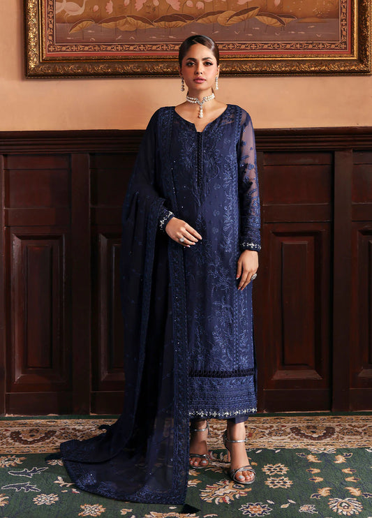 Model wearing Leesha by Gulaal in navy blue embellished chiffon – Pakistani luxury pret outfit available online in UK.