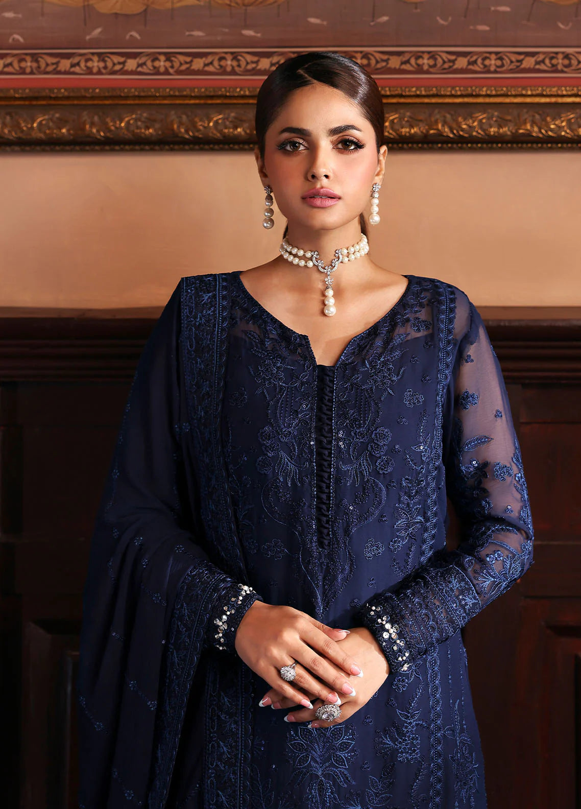 Model wearing Leesha by Gulaal in navy blue embellished chiffon – Pakistani luxury pret outfit available online in UK.