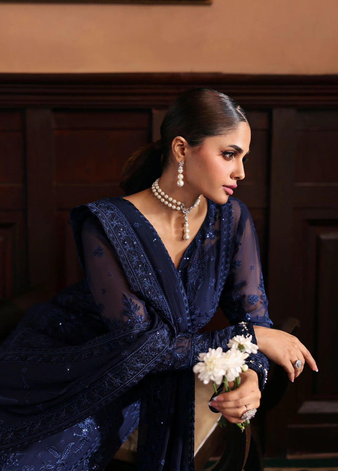 Model wearing Leesha by Gulaal in navy blue embellished chiffon – Pakistani luxury pret outfit available online in UK.