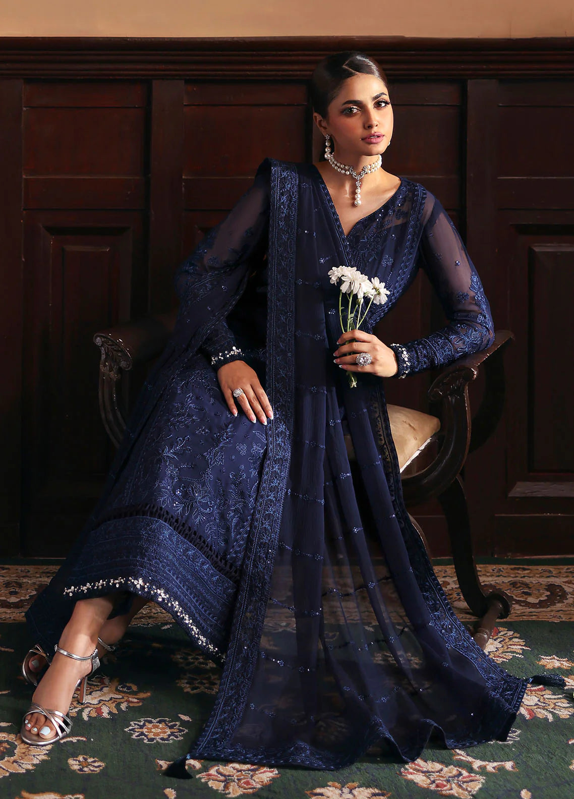 Model wearing Leesha by Gulaal in navy blue embellished chiffon – Pakistani luxury pret outfit available online in UK.