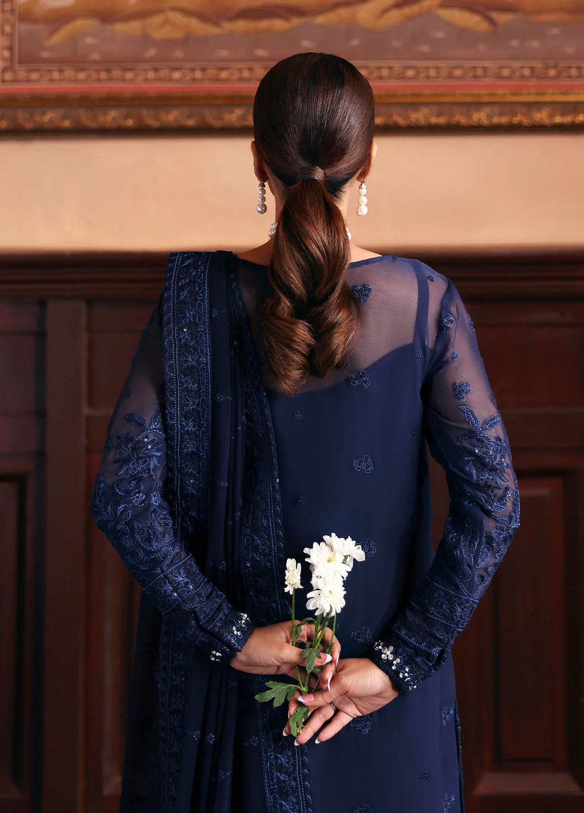Model wearing Leesha by Gulaal in navy blue embellished chiffon – Pakistani luxury pret outfit available online in UK.