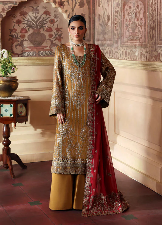 Model wearing Dinara by Gulaal in mustard and maroon with heavy chiffon embroidery – Pakistani luxury pret outfit online in UK.