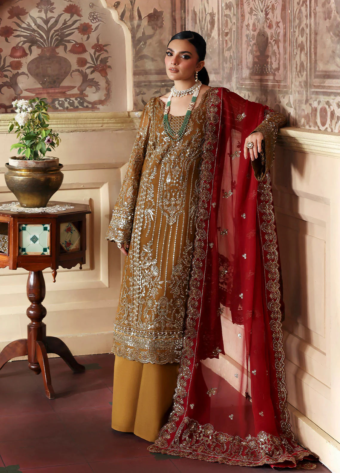 Model wearing Dinara by Gulaal in mustard and maroon with heavy chiffon embroidery – Pakistani luxury pret outfit online in UK.